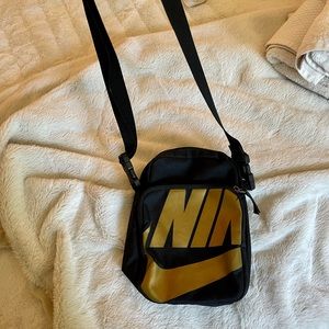 Nike gold and black crossbody bag